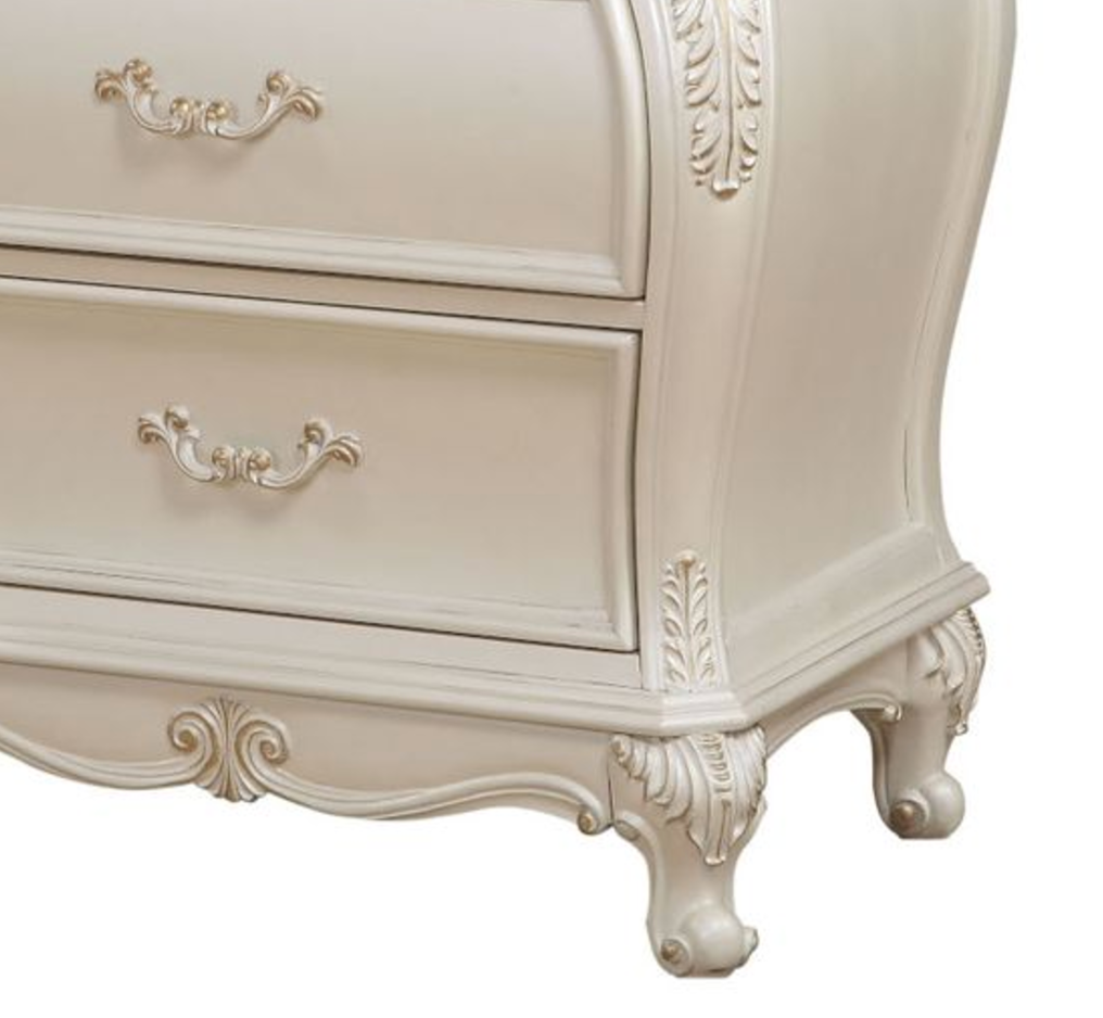 Cream ornate dresser with gold pull drawer hardware