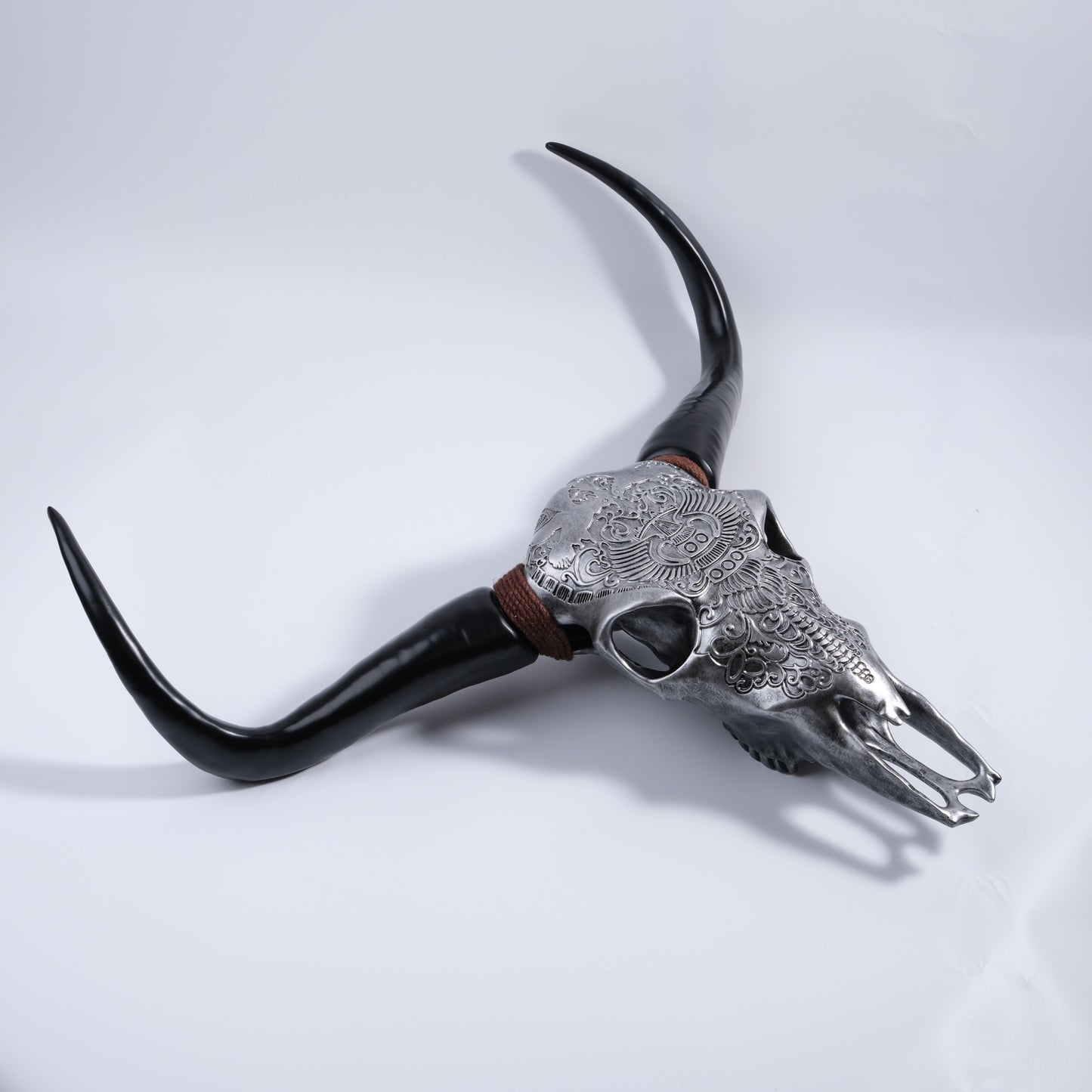 Textured silver longhorn skull with black horns