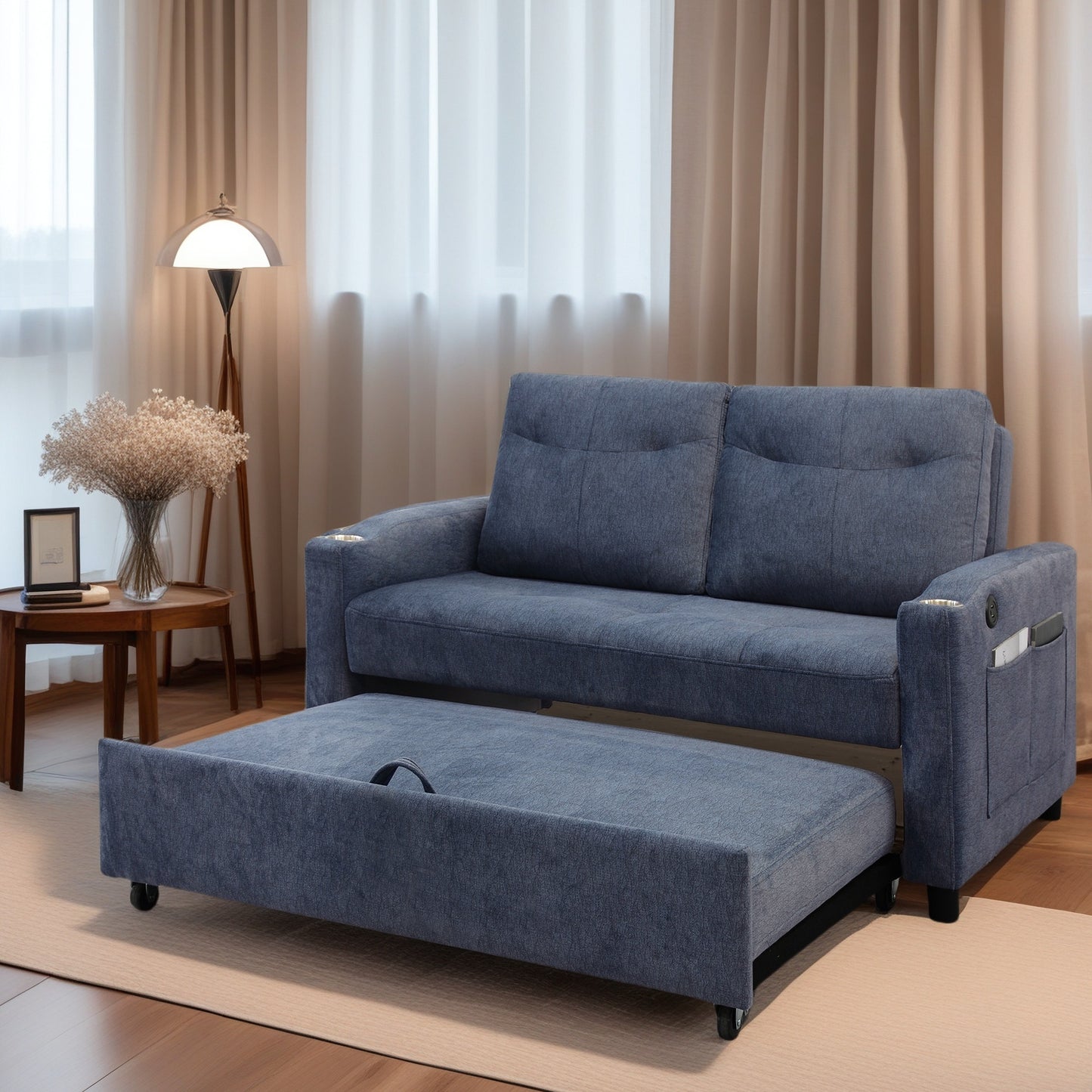Blue fabric sofa bed with pullout ottoman and side storage pockets