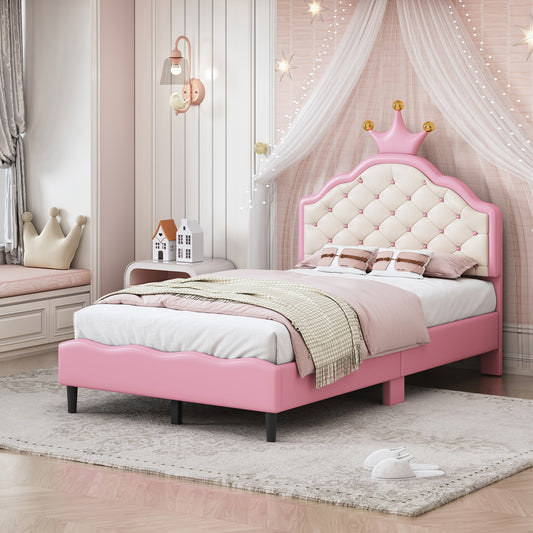 Pink upholstered twin bed with tufted headboard and crown accent