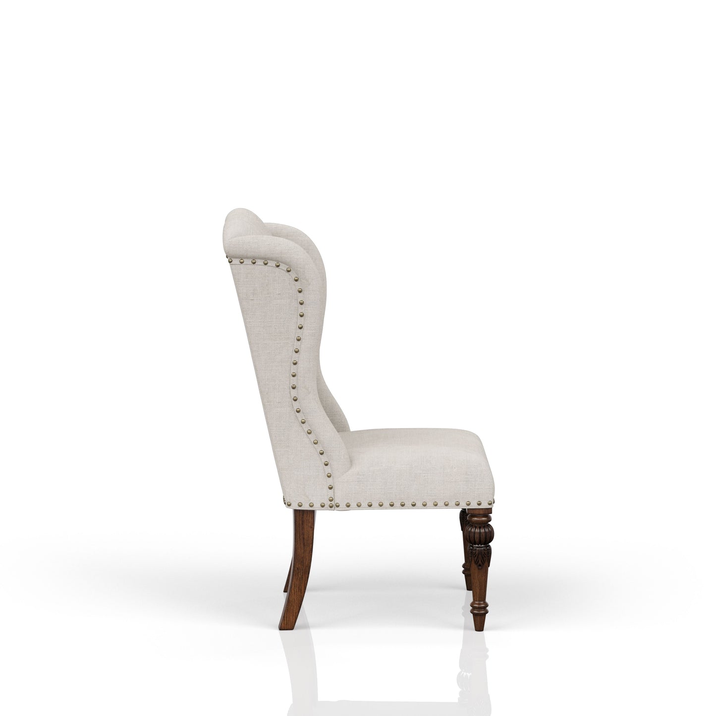 Elegant wingback accent chair in beige linen with antique brass nailhead trim and carved dark wood legs
