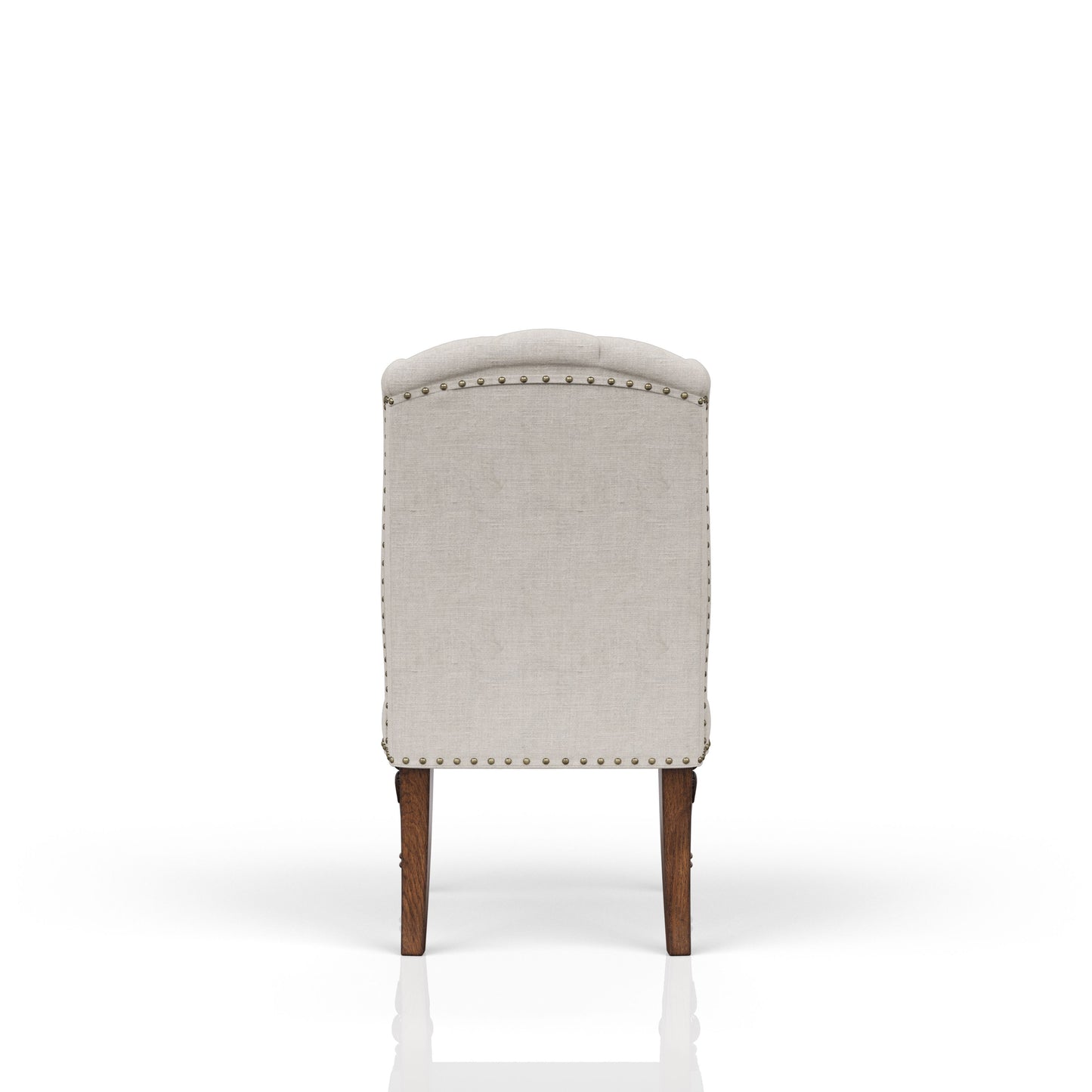 Tufted linen accent chair with brass nailhead trim and carved wooden legs
