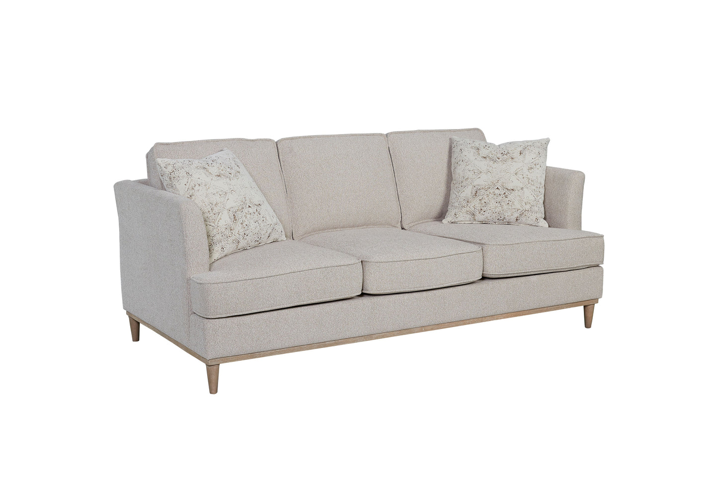 Light beige linen threeseater sofa with two decorative throw pillows