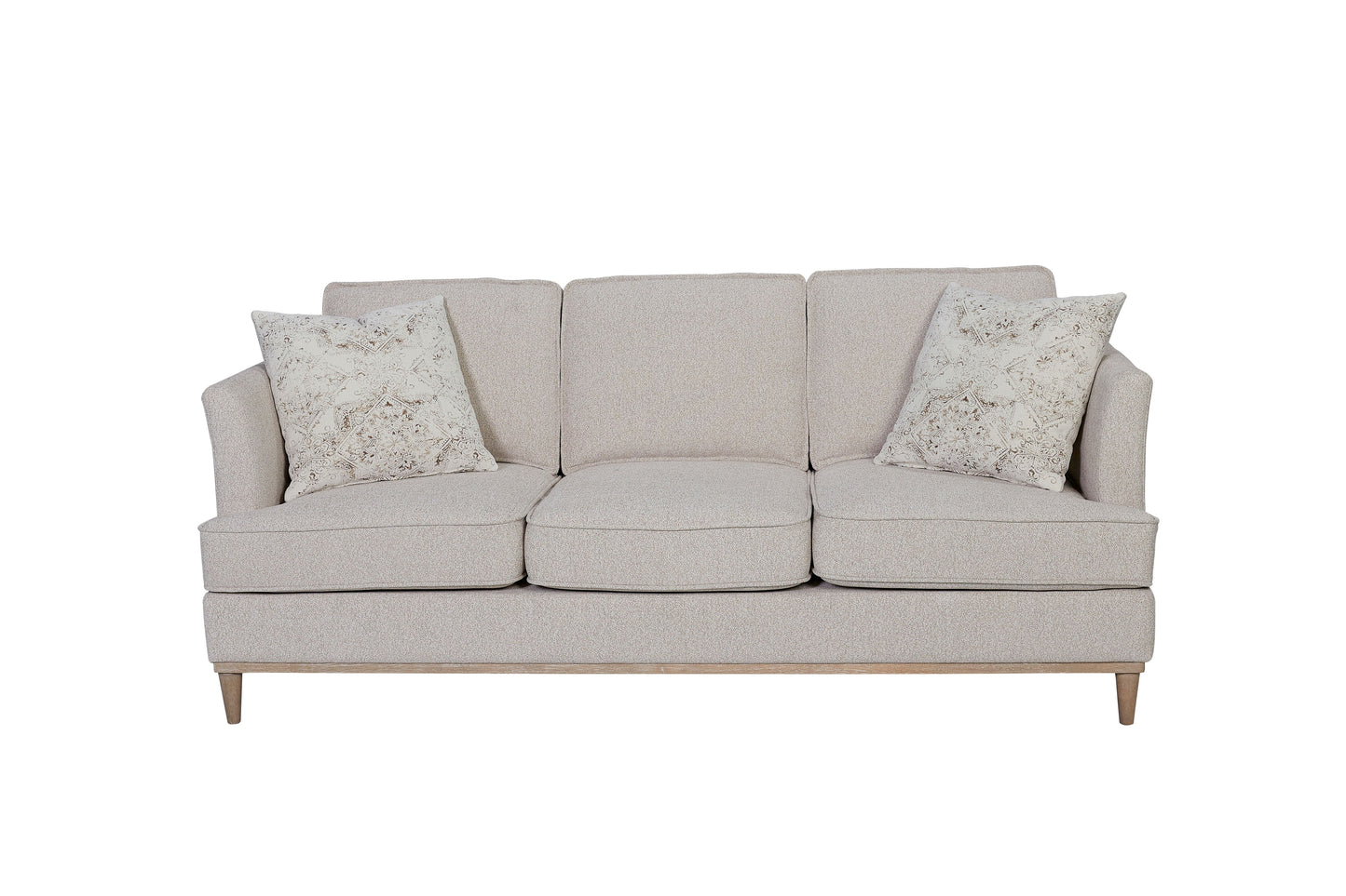 Beige upholstered threeseater couch with decorative throw pillows