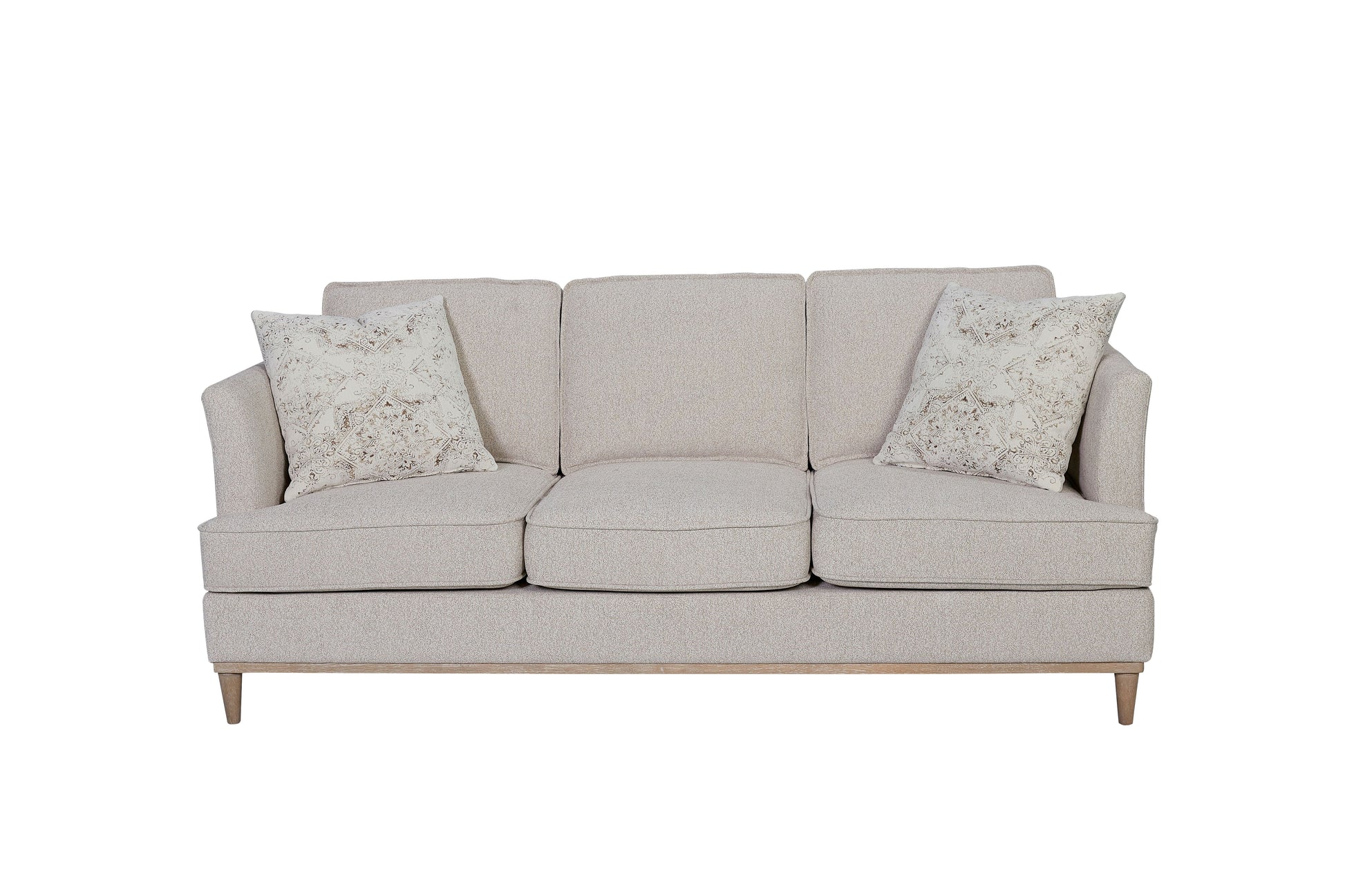 Beige upholstered threeseater couch with decorative throw pillows
