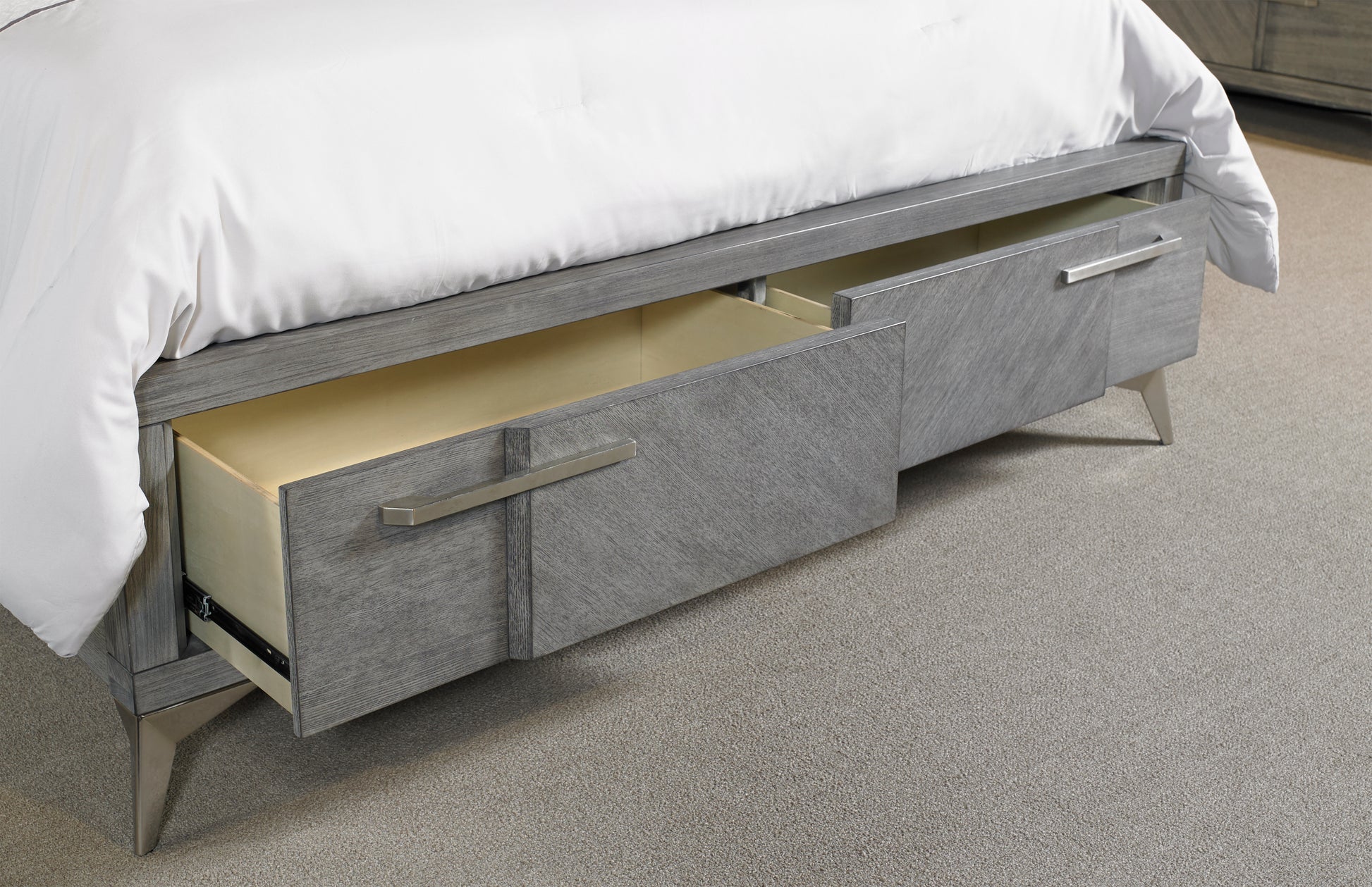 Gray wood bed frame with open storage drawers and brushed nickel hardware