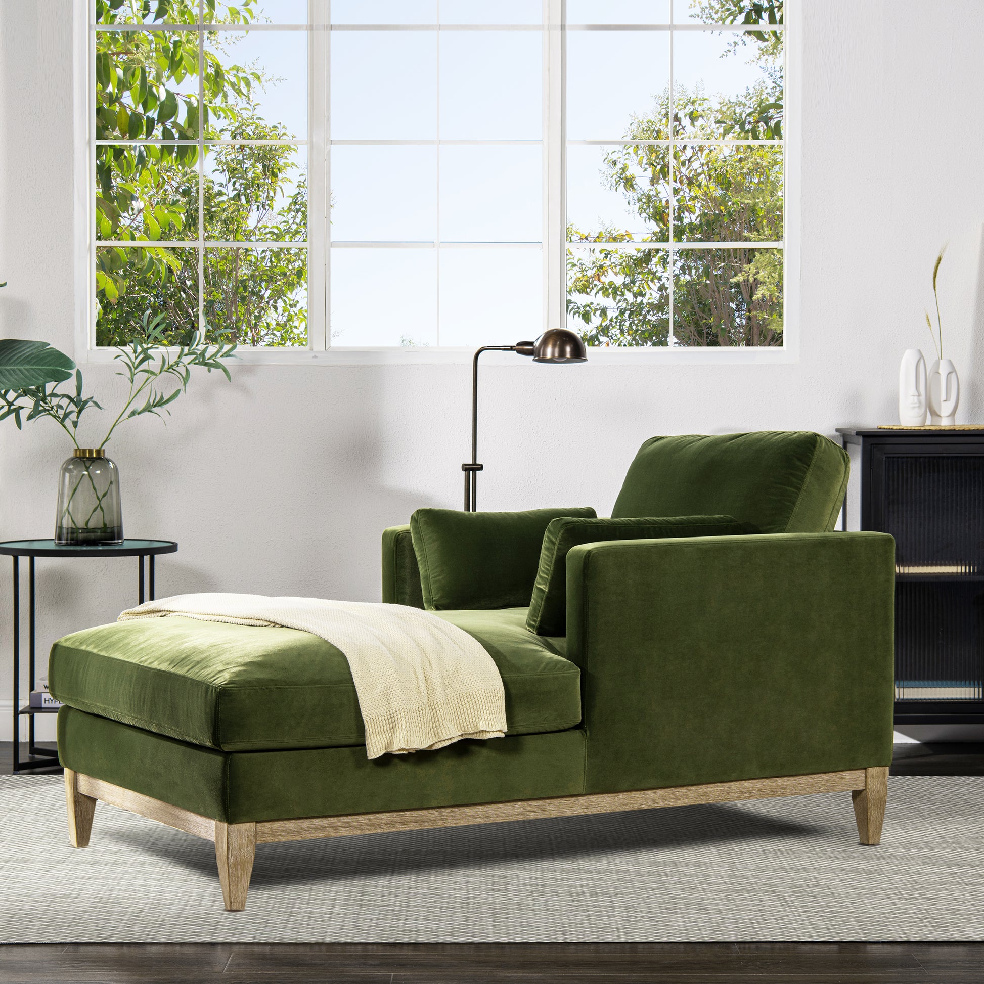 Olive green velvet chaise lounge with modern wood legs