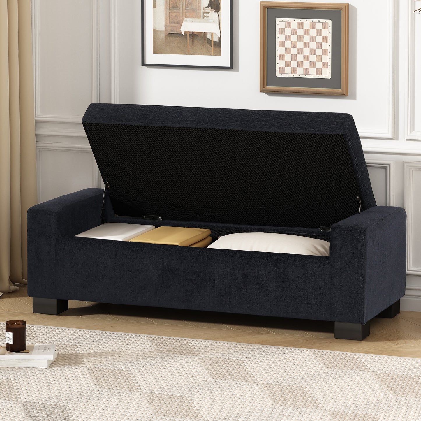 Dark navy upholstered storage bench with lid open revealing storage space