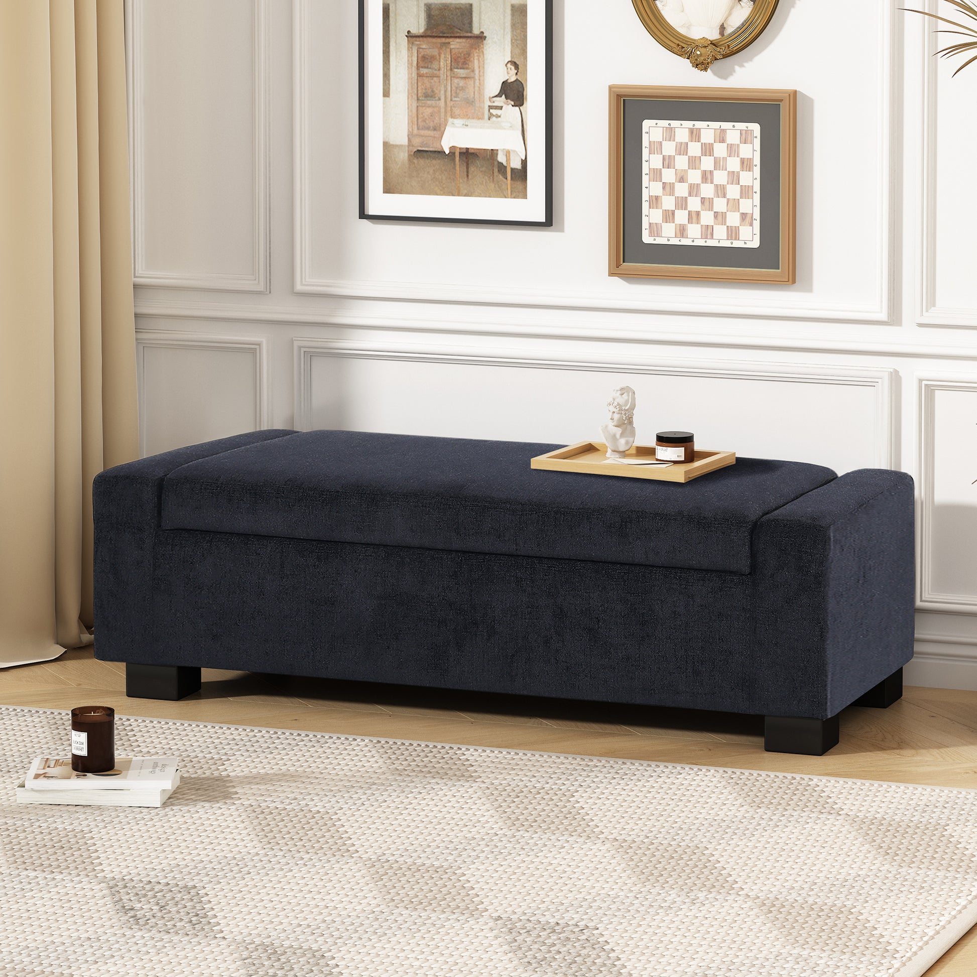Dark navy upholstered storage bench with tufted lid and wooden legs