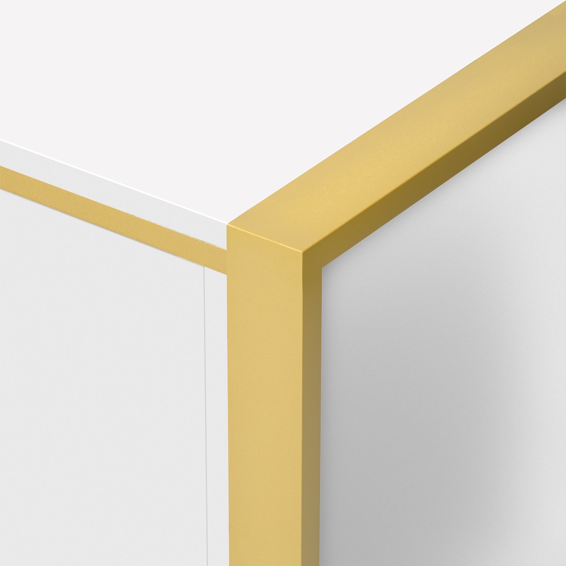 Sleek white shelf with a brushed gold metal trim edge