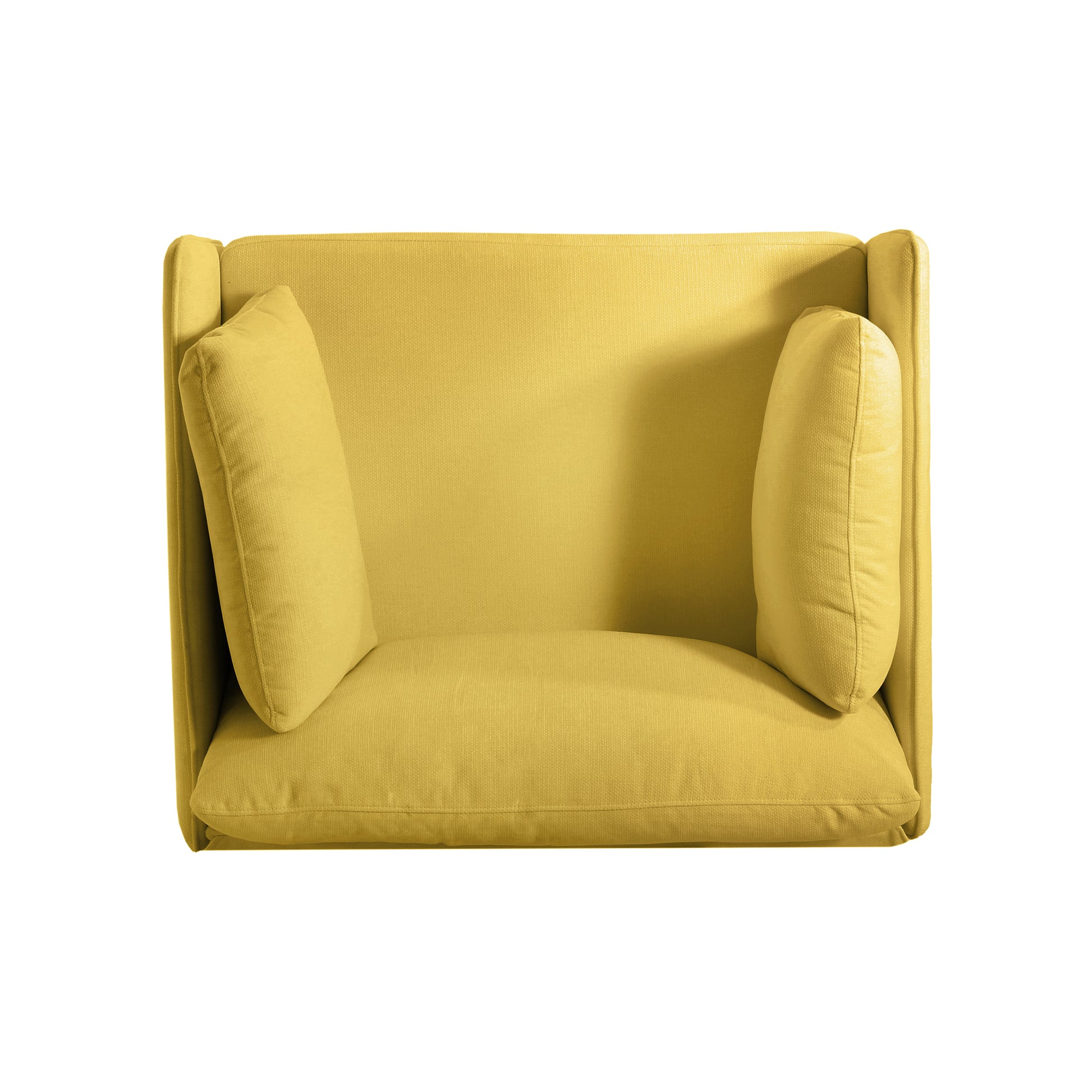Textured yellow armchair with accent pillows