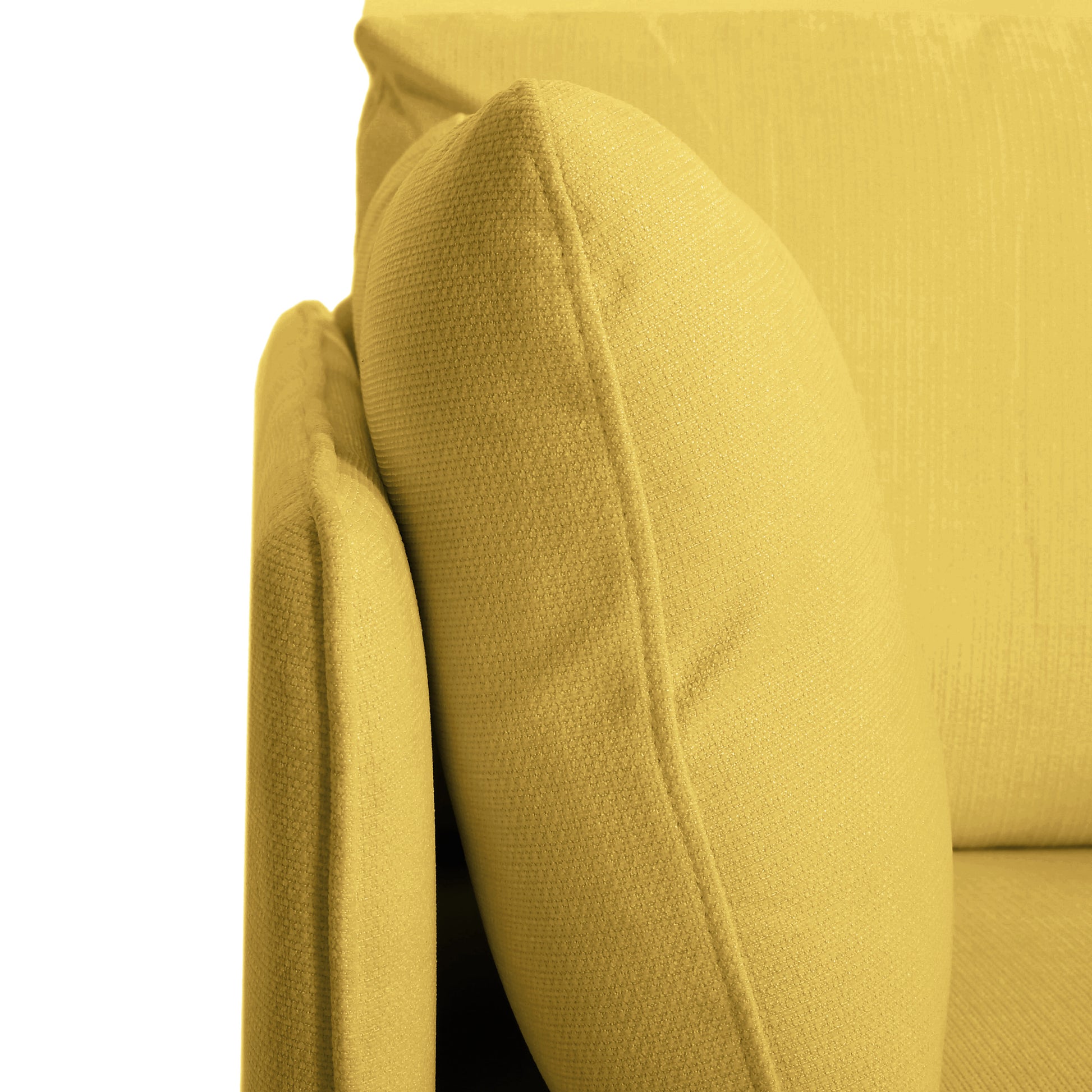 Yellow textured fabric armchair cushion closeup