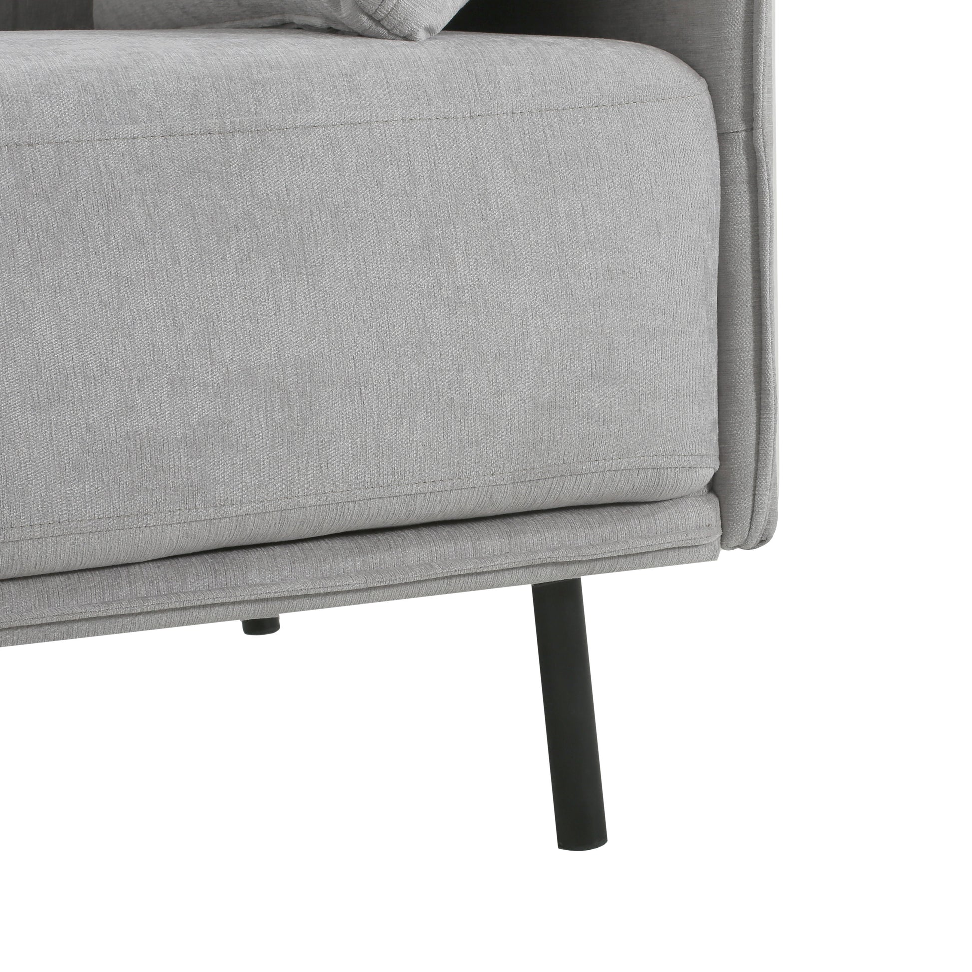Close up of light gray fabric sofa armrest detail