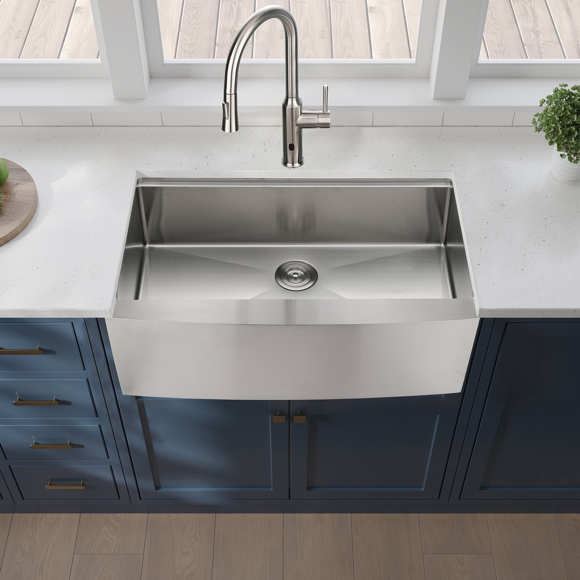 Stainless steel farmhouse kitchen sink with brushed nickel faucet