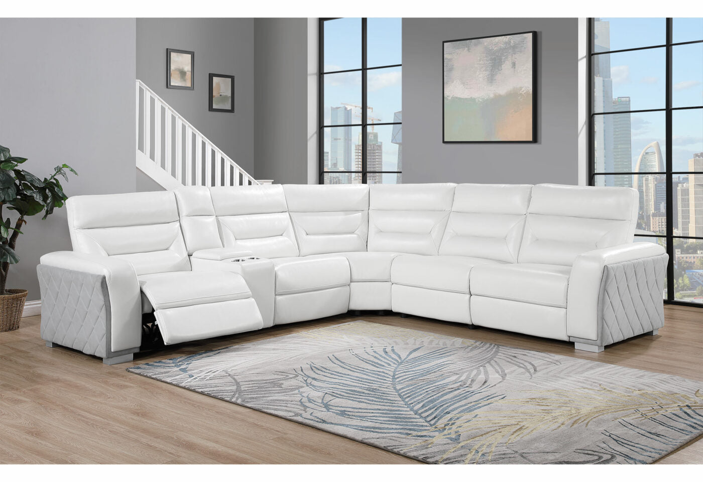 White leather sectional sofa with reclining seats and cup holders