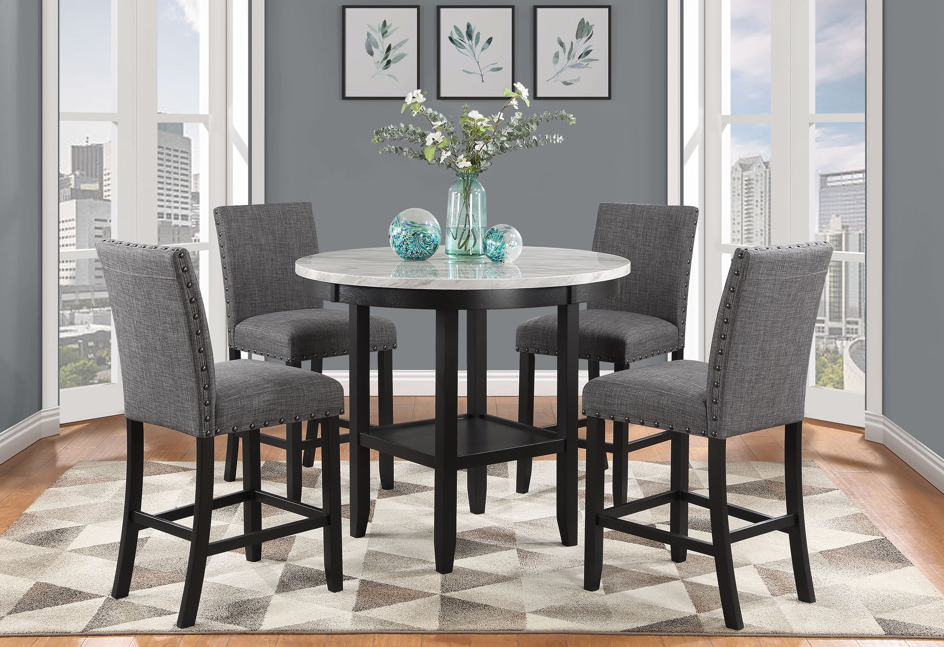 Gray upholstered counter stool with silver nailhead trim
