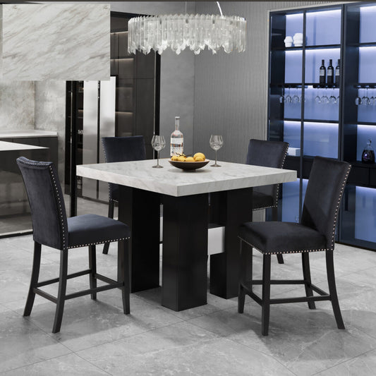 Square marble top bar table with four black velvet bar stools