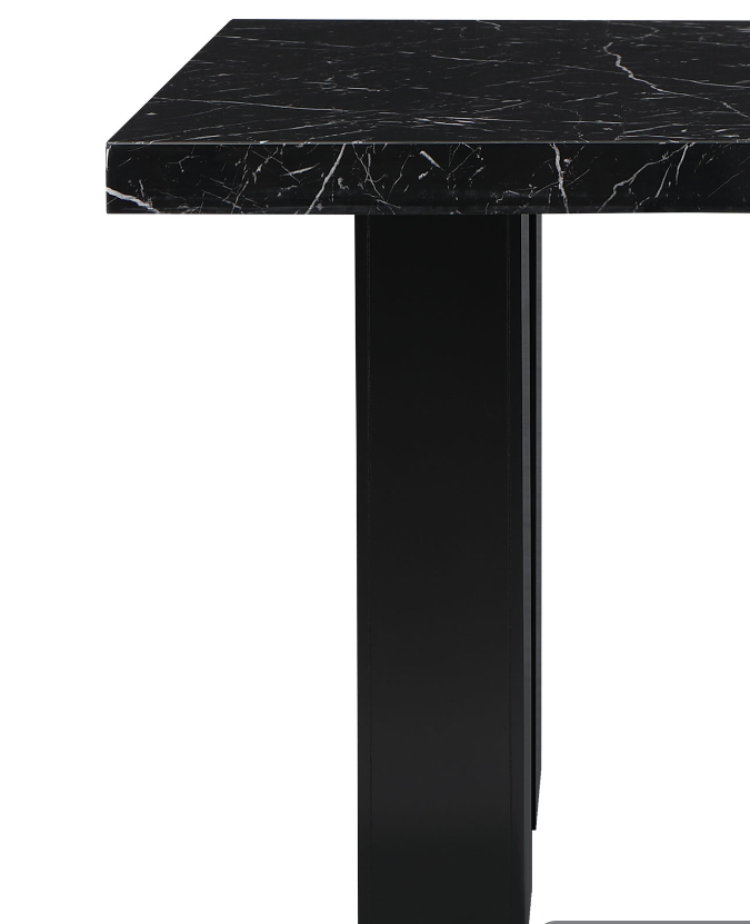 Black marble top dining table with sleek black pedestal base