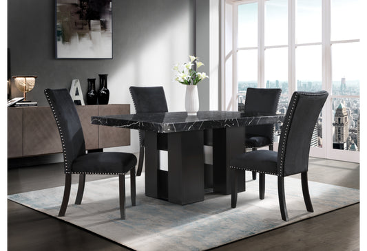 Black marble dining table with tufted black chairs