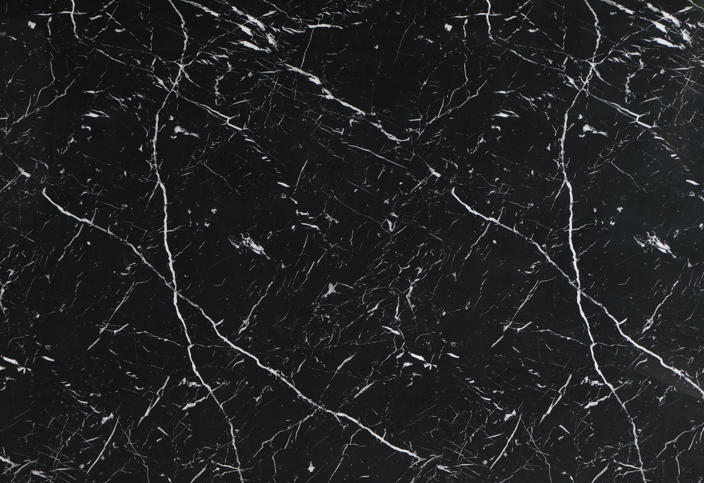 Black marble textured wallpaper with white veining for interior design