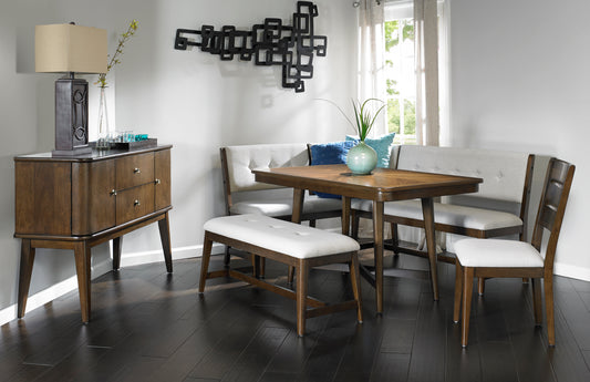 Midcentury modern dining table with upholstered bench and chairs