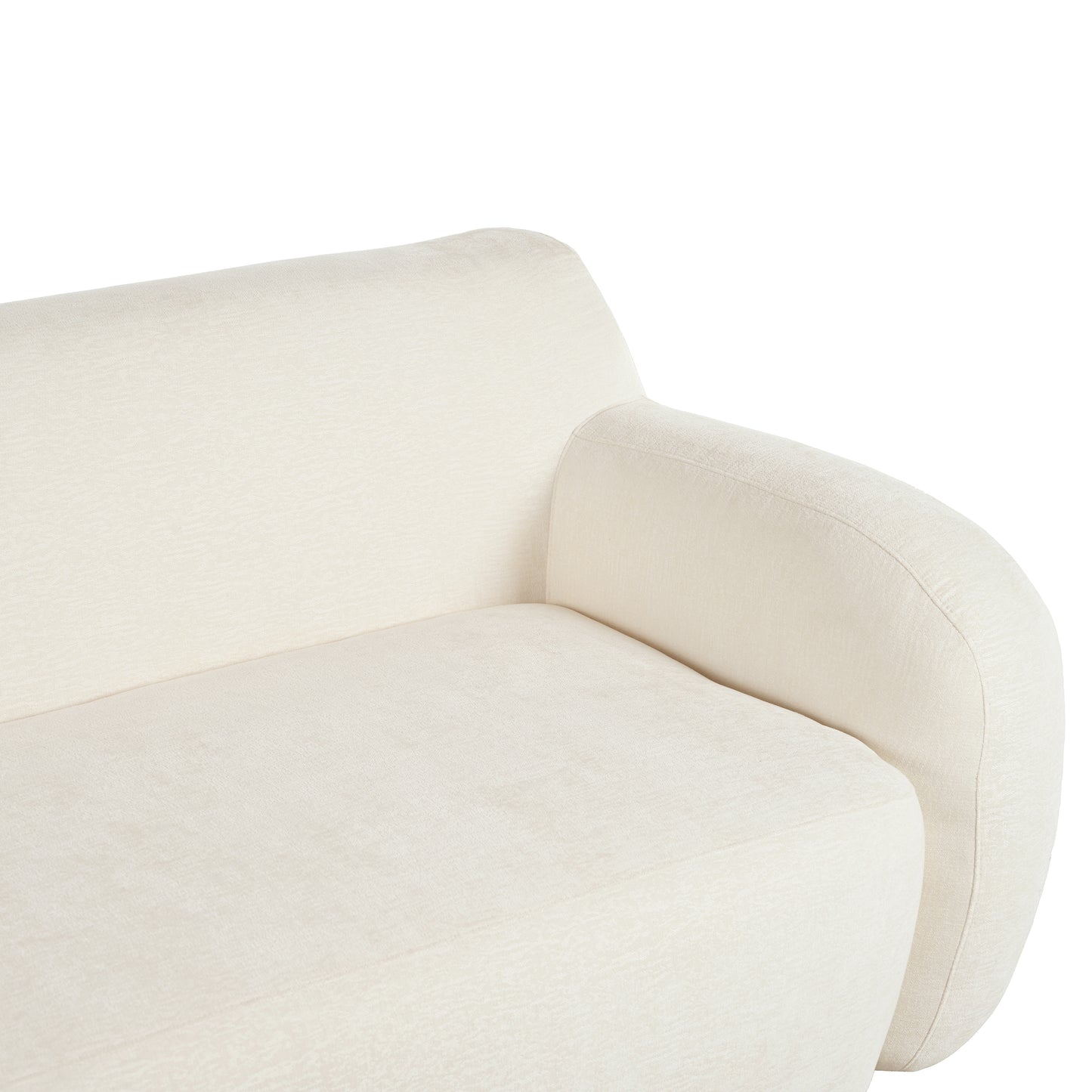 Closeup of a textured cream fabric sofa armrest and seat cushion