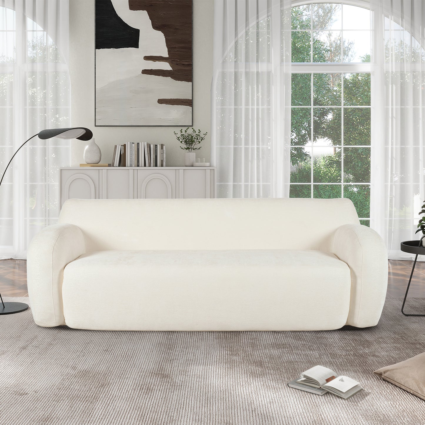 Cream boucl fabric sofa with rounded arms and a plush texture for modern living rooms