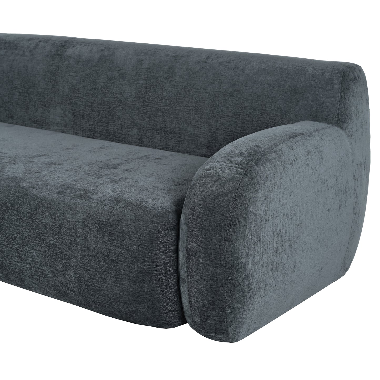 Charcoal grey velvet sofa with rounded armrest and textured fabric upholstery
