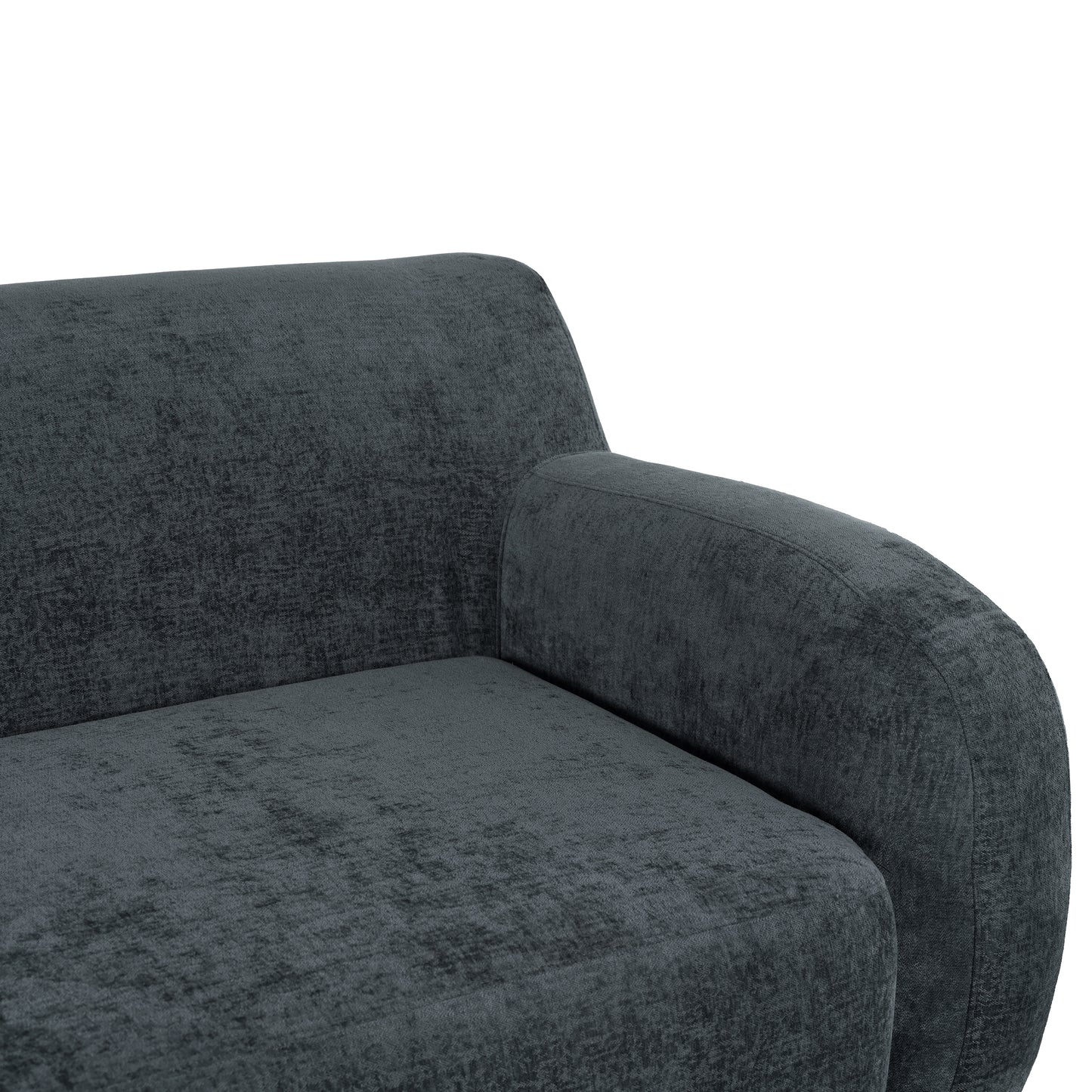 Closeup of a plush dark grey velvet sofa armrest