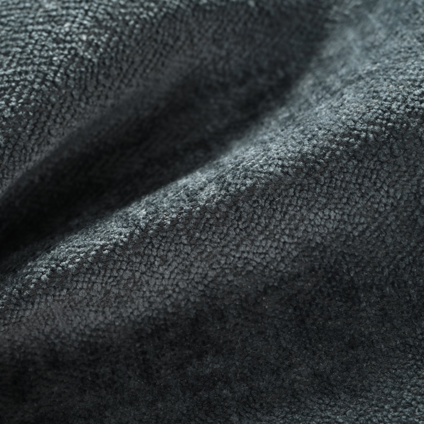 Closeup of textured dark gray fleece fabric