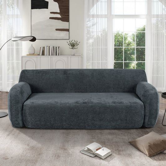 Dark grey textured fabric sofa with rounded arms and plush cushions