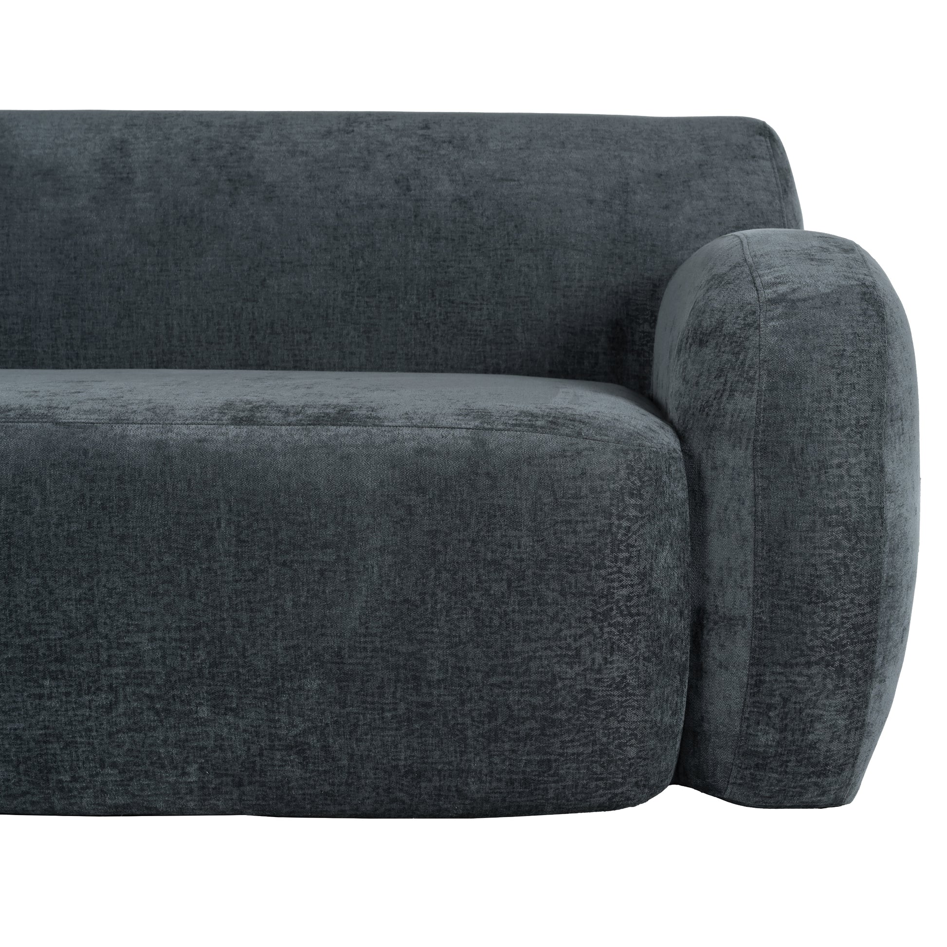 Deep charcoal velvet sofa arm and seat detail