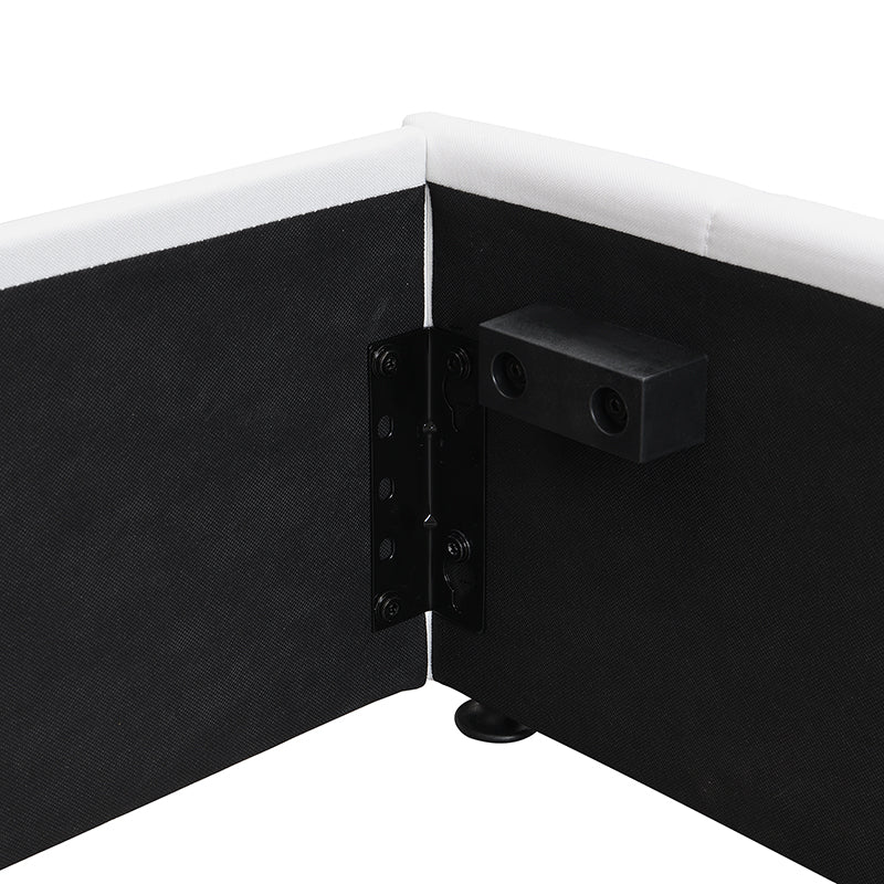Black metal bed frame bracket with corner fabric join detail