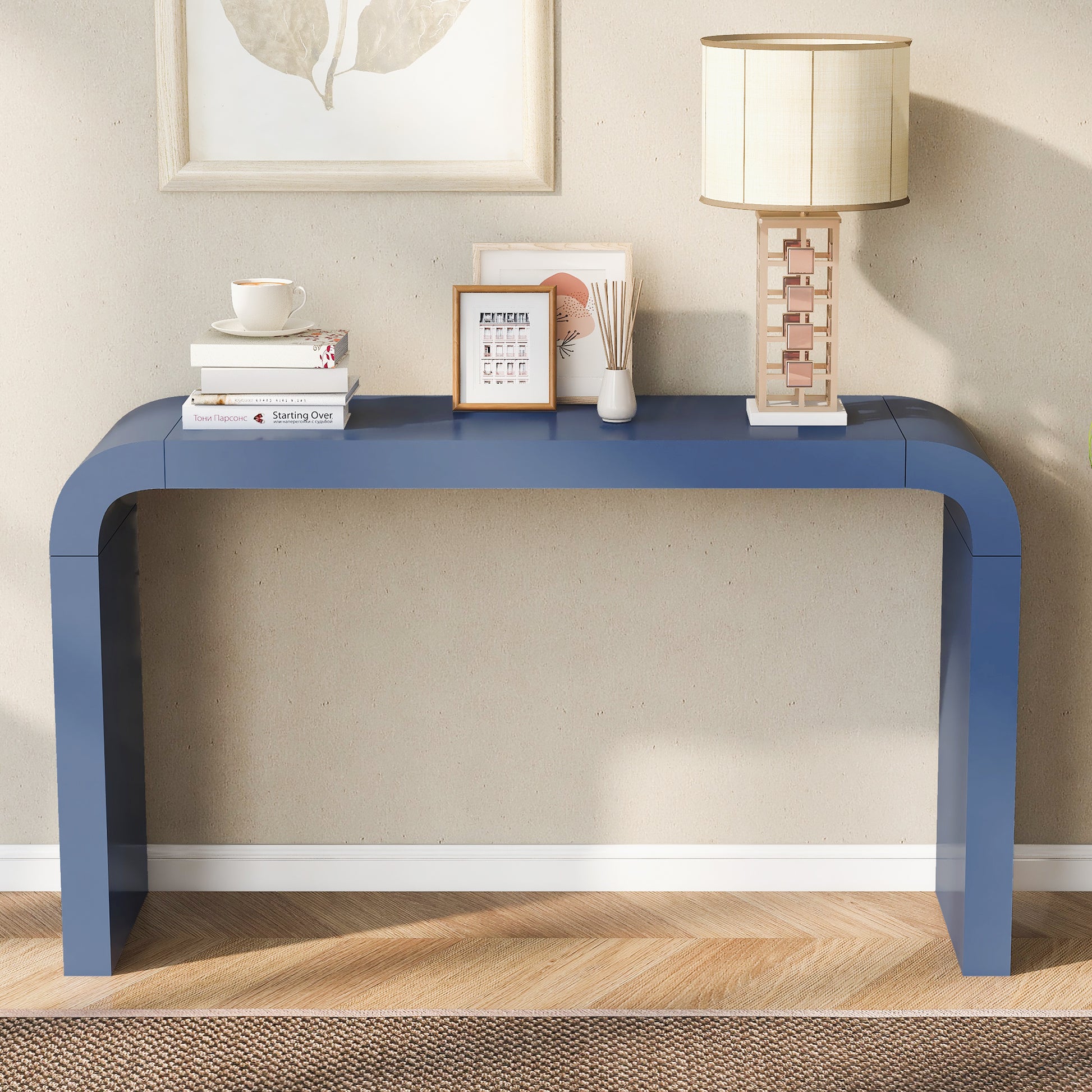 Sleek blue console table with rounded edges perfect for modern entryway decor