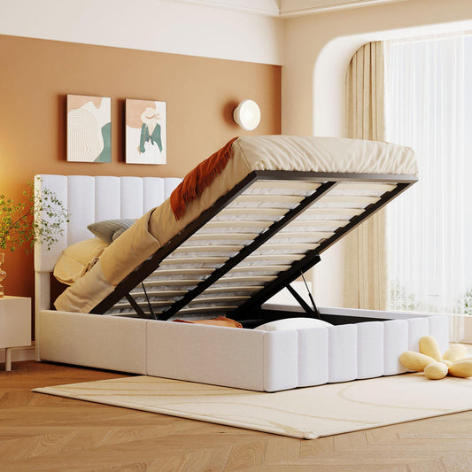 White upholstered platform bed with lifted frame revealing storage