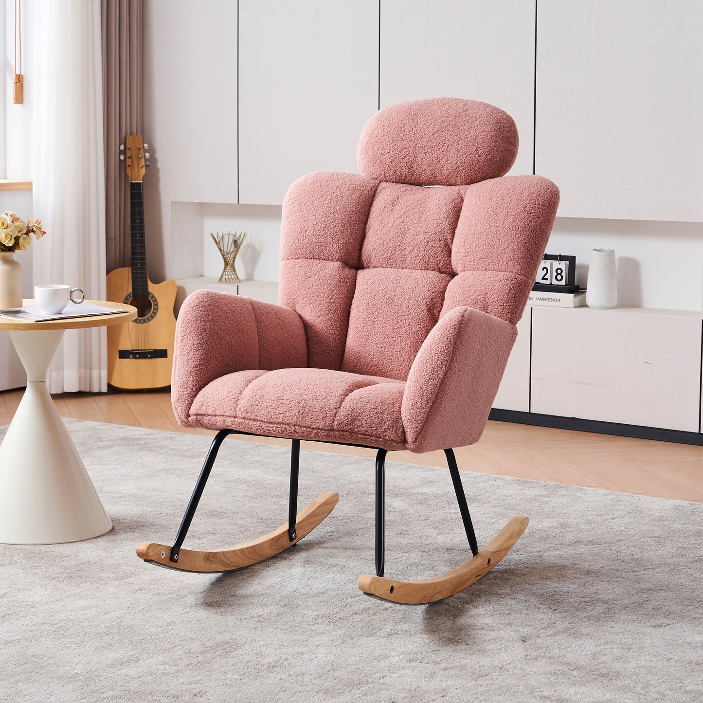 Pink teddy fabric rocking chair with cushioned back and seat