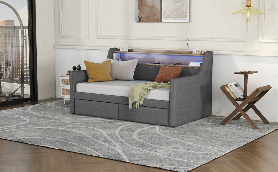 Grey upholstered daybed with storage drawers and builtin LED lighting