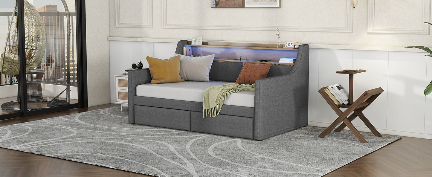 Grey upholstered daybed with LED backlighting and storage drawers