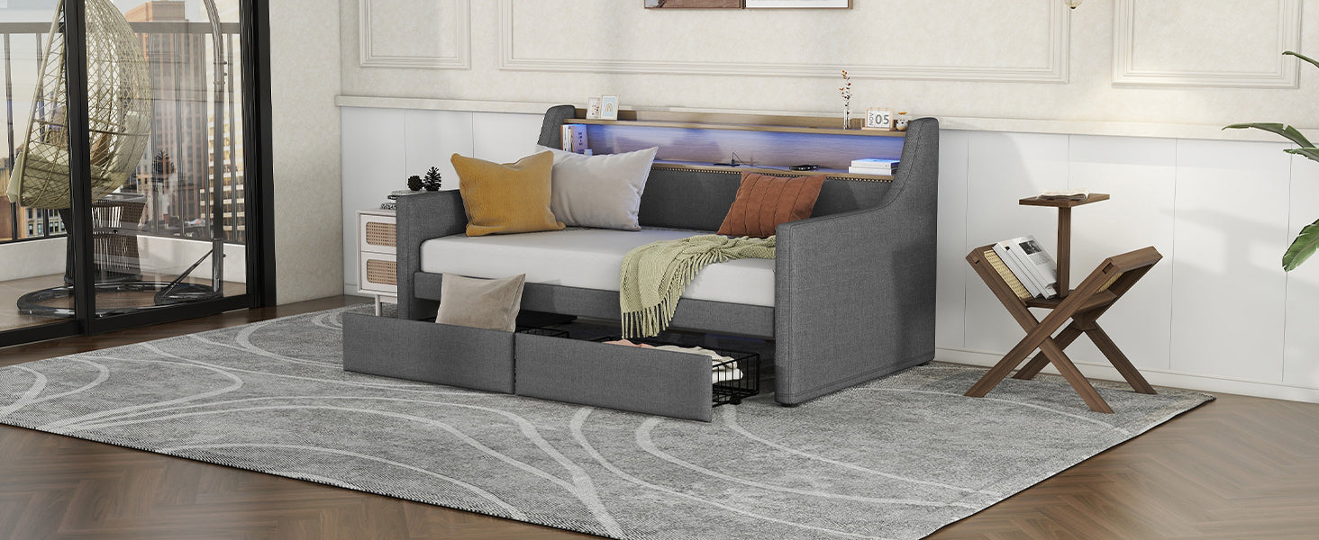 Grey upholstered daybed with builtin LED lighting and storage drawers