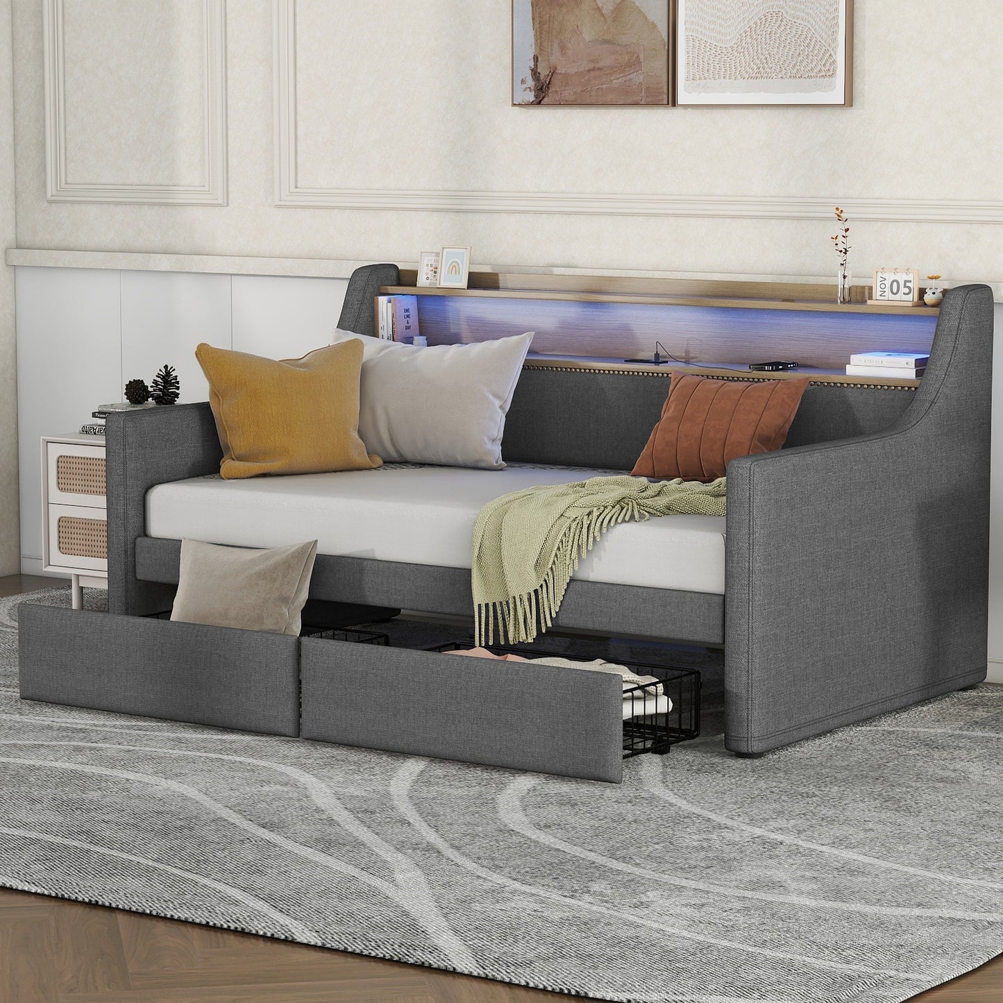 Gray fabric daybed with builtin storage drawers and LED headboard