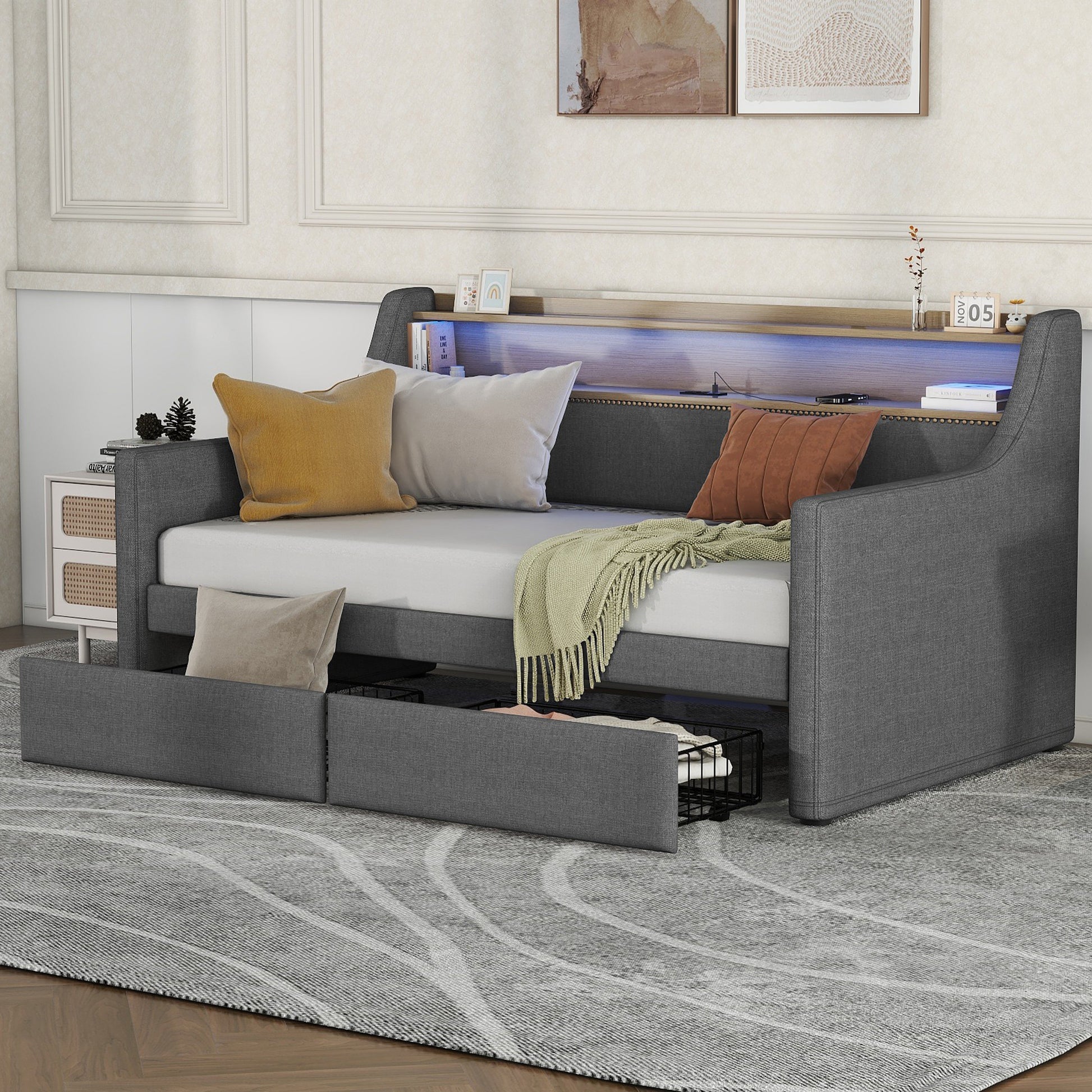 Gray fabric daybed with builtin storage drawers and LED headboard