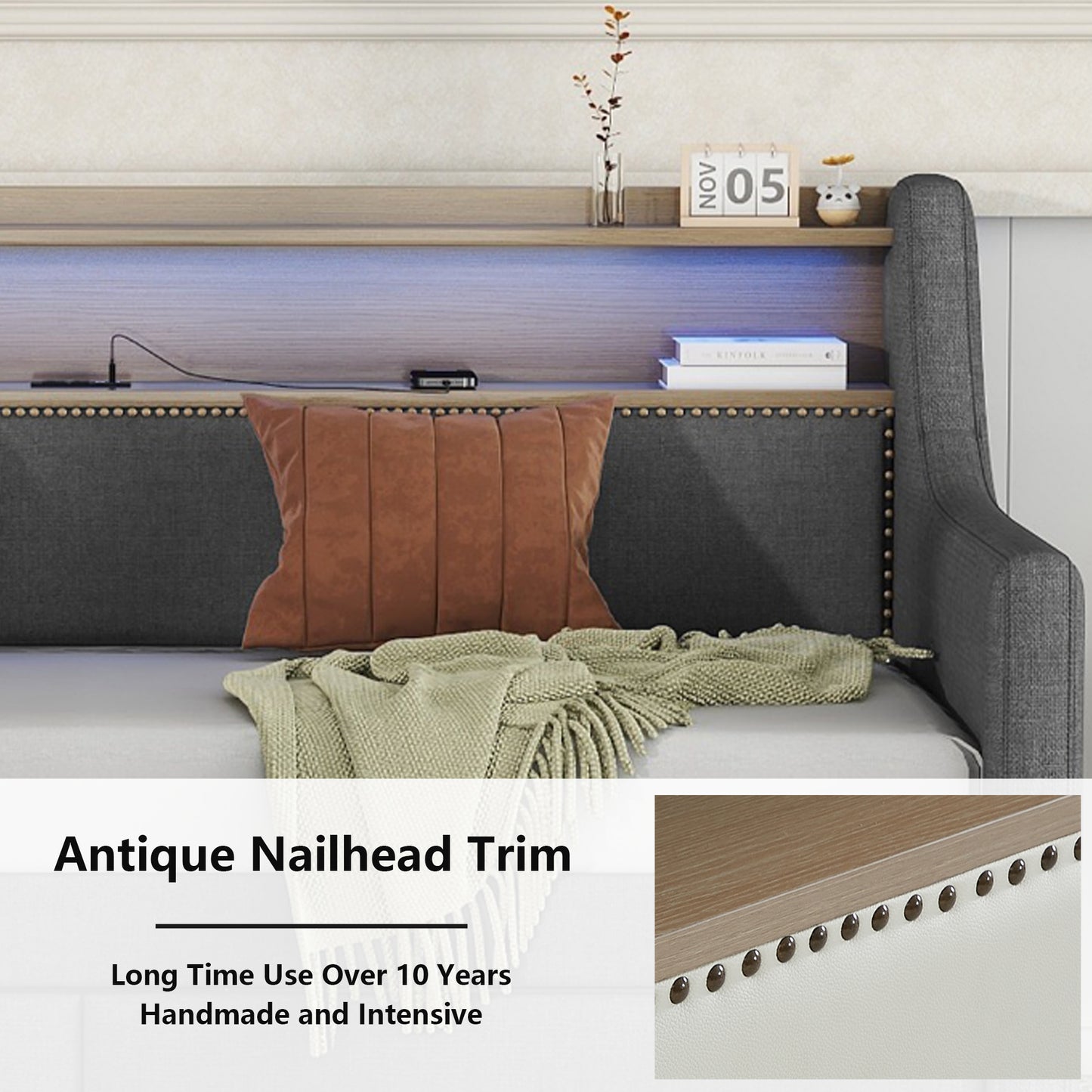 Closeup of charcoal grey daybed with antique nailhead trim detail
