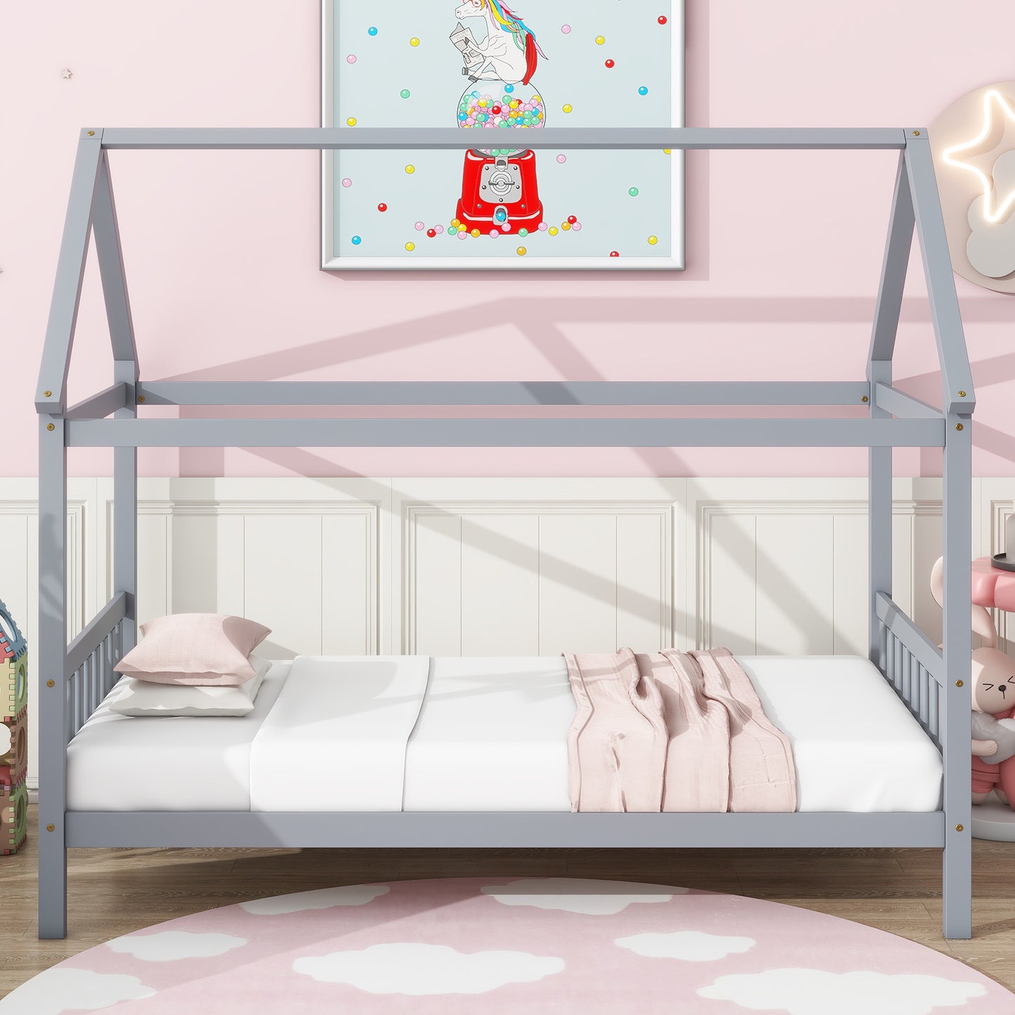 Gray wooden house bed frame with white bedding and pink throw