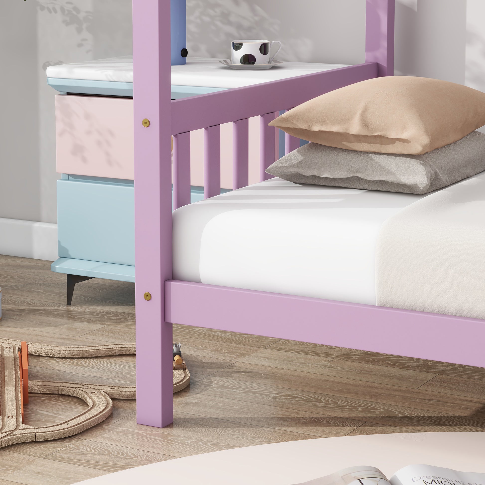 Purple twin bed frame with white bedding and beige and gray pillows