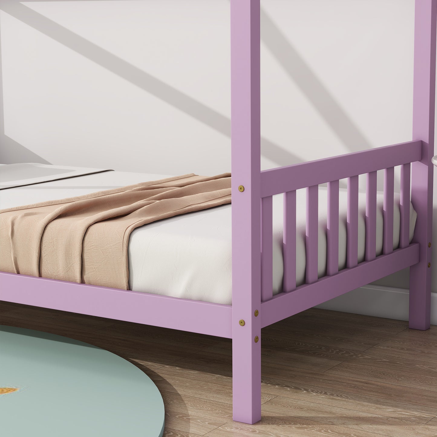 Lavender wooden toddler bed with white mattress and beige blanket