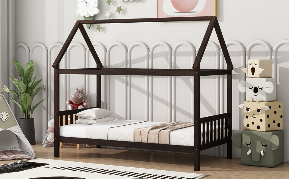 Dark brown wooden house bed frame with white bedding and blanket