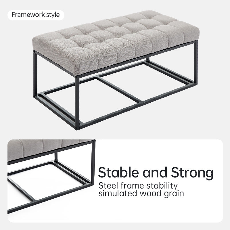 Tufted upholstered ottoman bench with a black metal framework