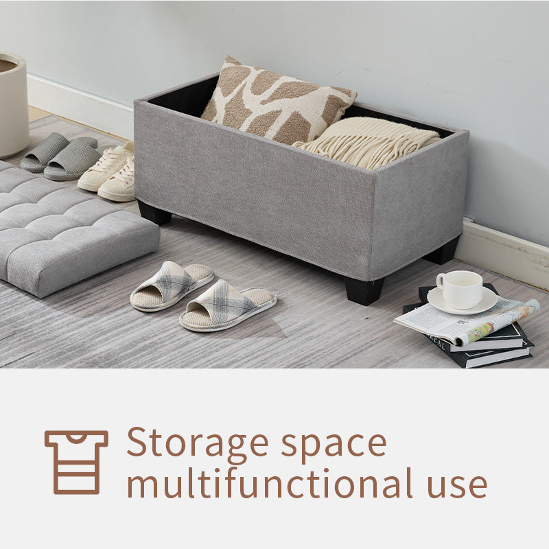 Gray fabric storage ottoman with tufted seat