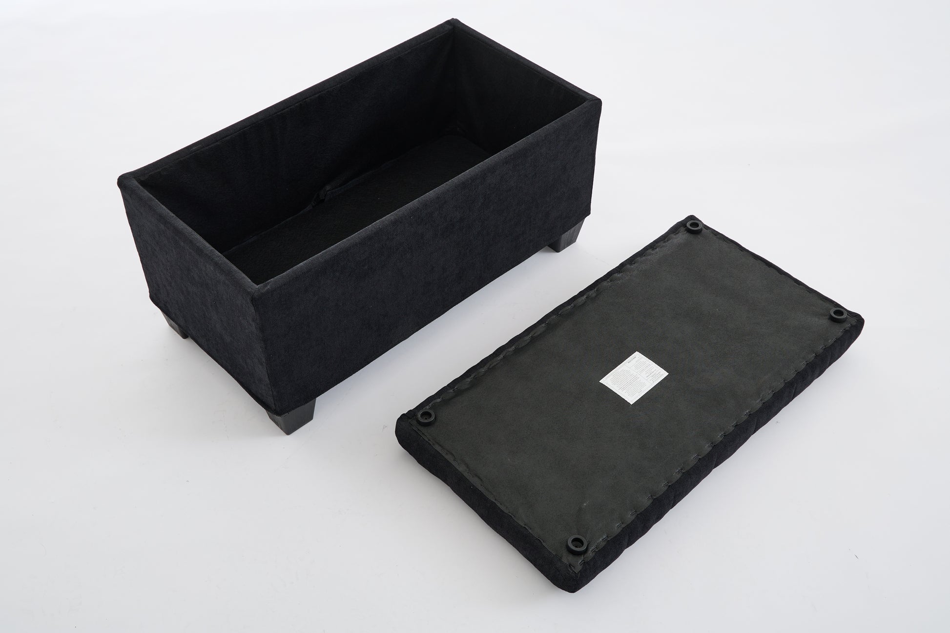 Black fabric storage ottoman with removable lid  wooden feet ideal for entryway or bedroom