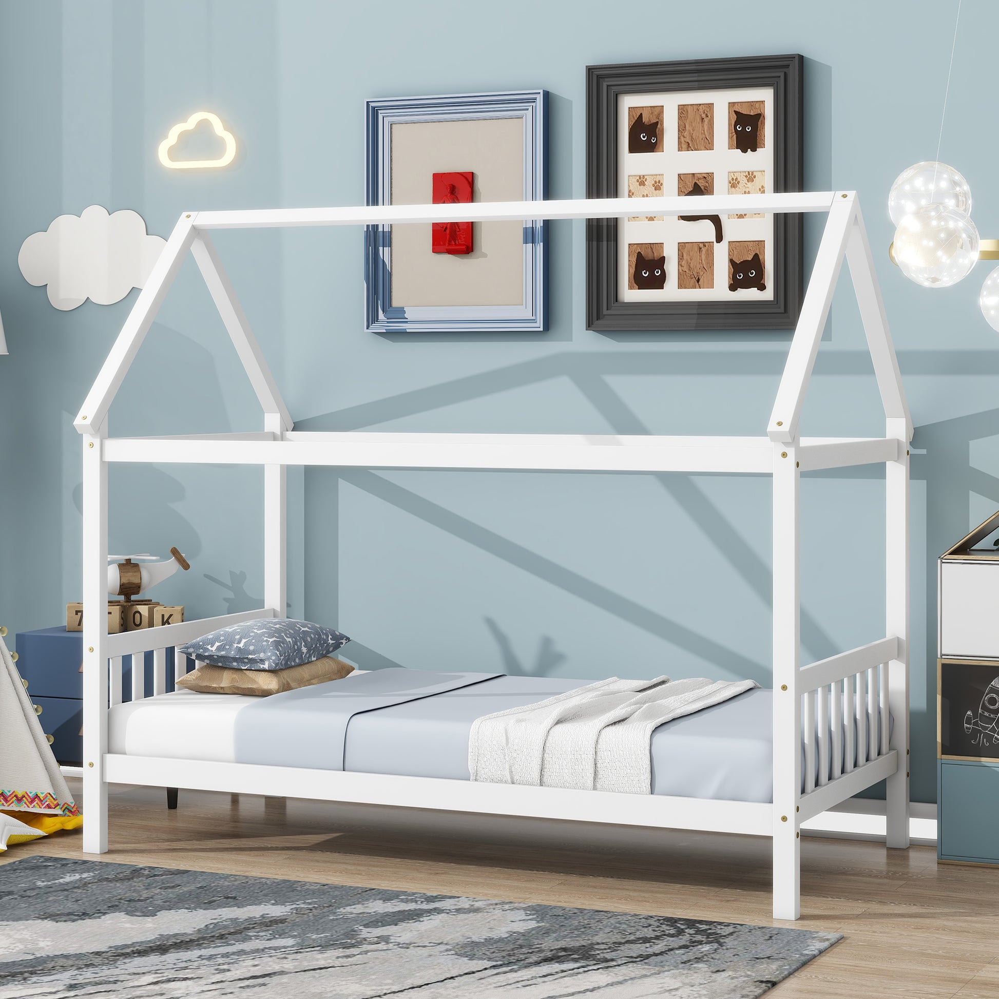 White wooden house bed frame with slatted sides and roof